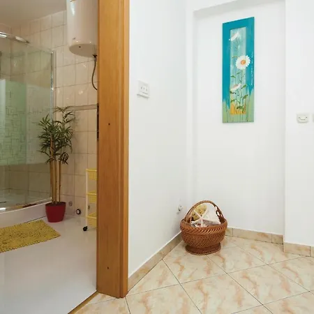 Three-bedroom In Apartment Pirovac
